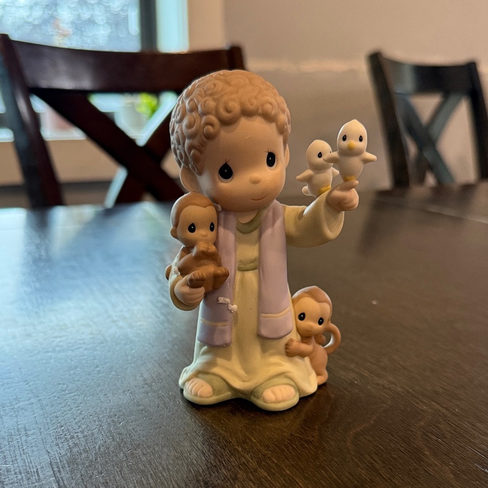 Adorable Figurine with Birds and Monkeys
